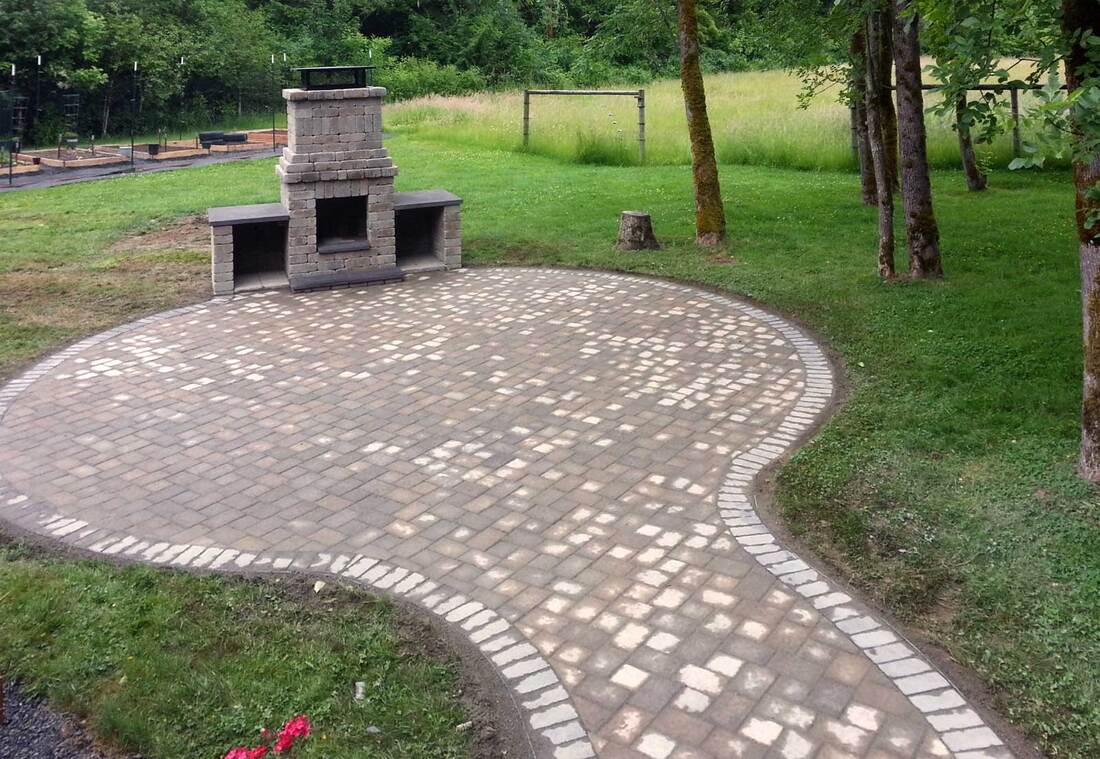 Firepit with matching paver patio and connecting pathway