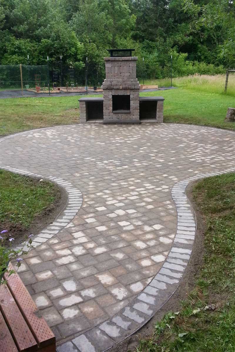 paver pathway leading to fire pit