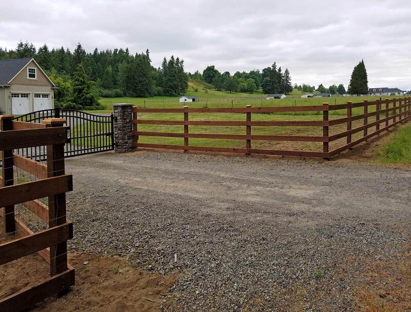 farm fence with iron gate