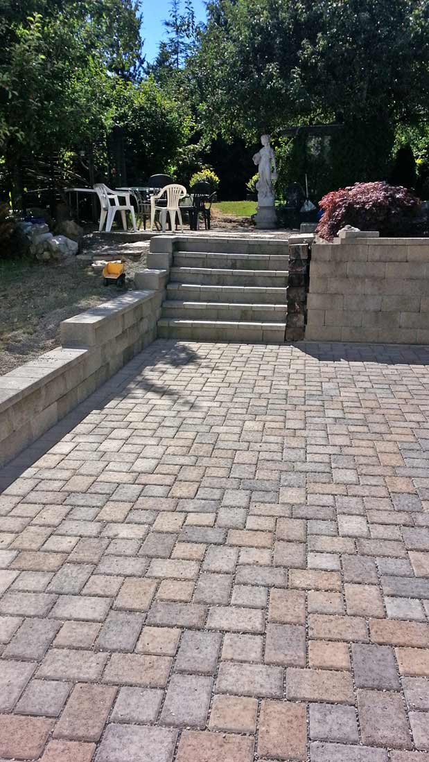 finished paver patio, retaining wall