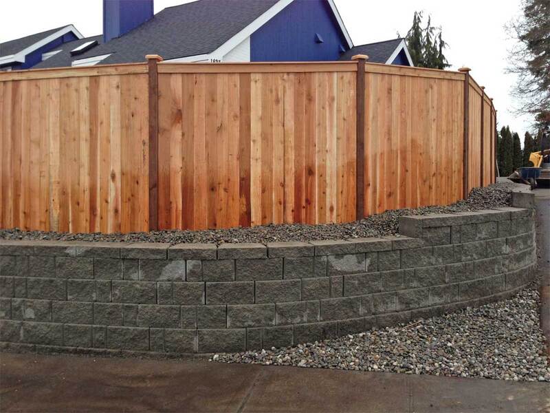after new fence and retaining wall