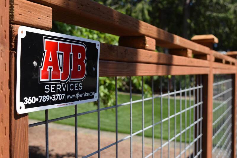 deer fence with AJB sign