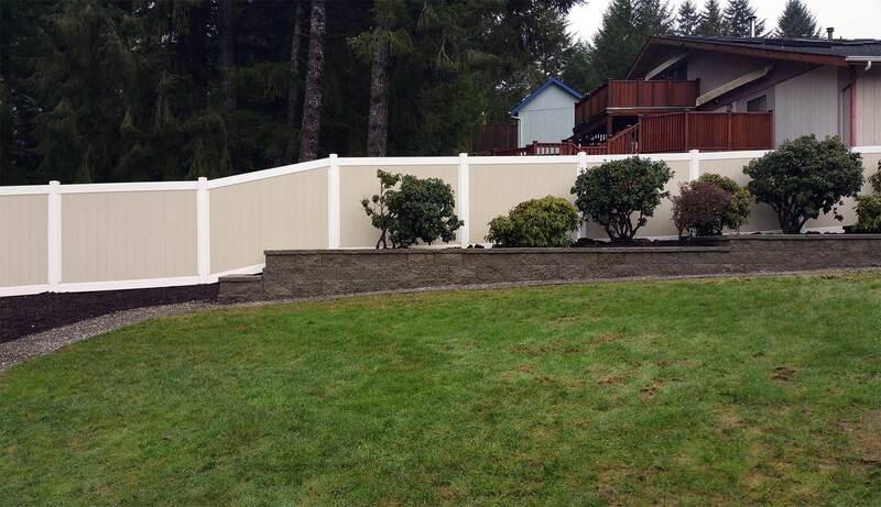 New Vinyl Fence and Retaining Wall