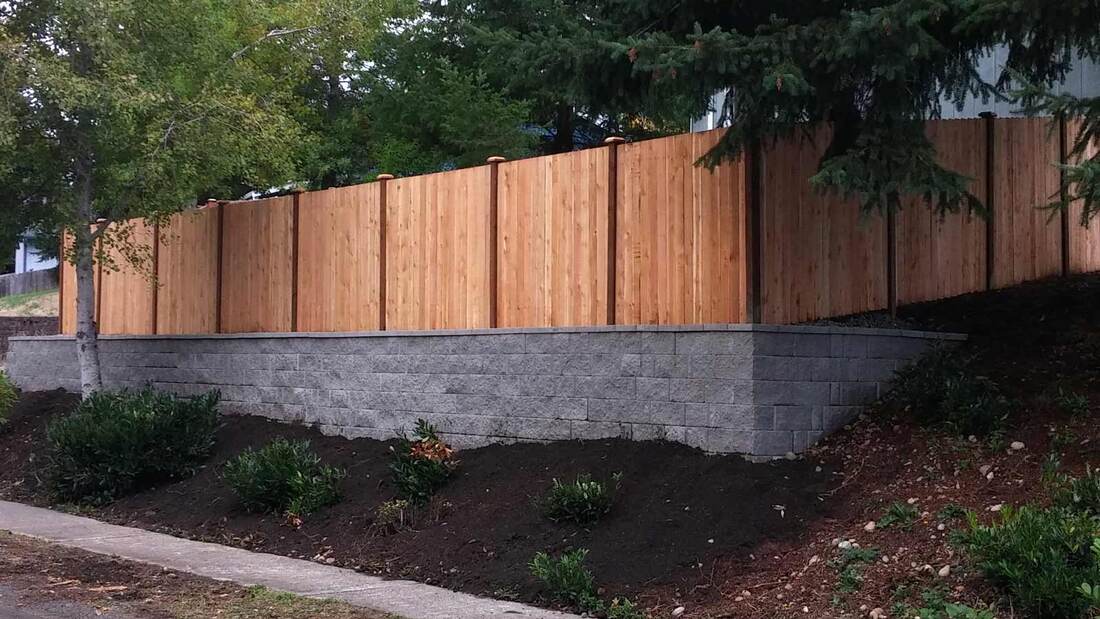 cedar fence and retaining wall