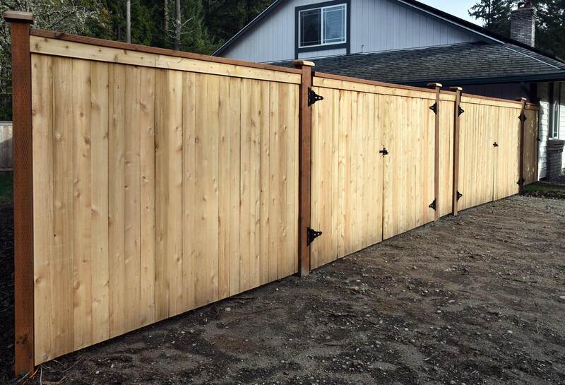 Wood security fence with dual swing gates